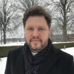 Porträttbild av Nils-Ola Svensson