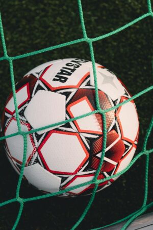 close up of a soccer ball in the goal
